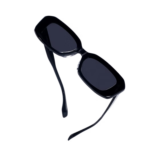 Black sunglasses with dark lenses on a white background